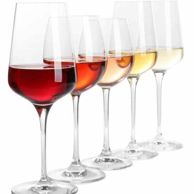 Row,Of,Glasses,With,Different,Wines,On,White,Background